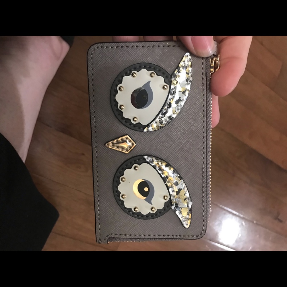 Kate spade authentic gray owl keychain wallet.